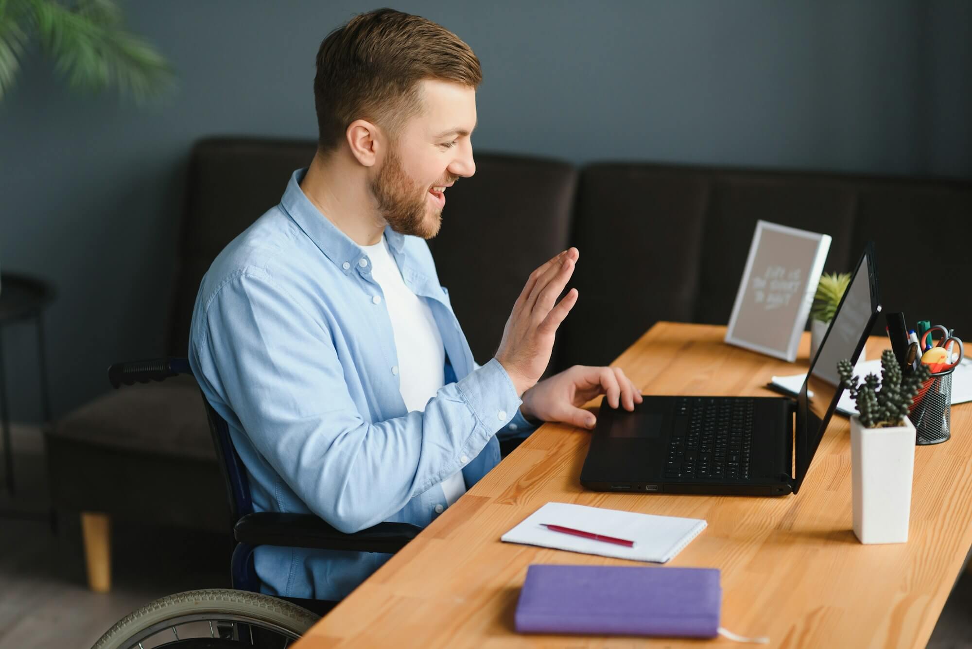 disabled-virtual-assistant-in-wheelchair-making-remote-video-call-.jpg